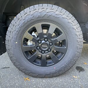 Flat Black Lug Nuts and Silver TOYOTA Logo Center Caps.jpg