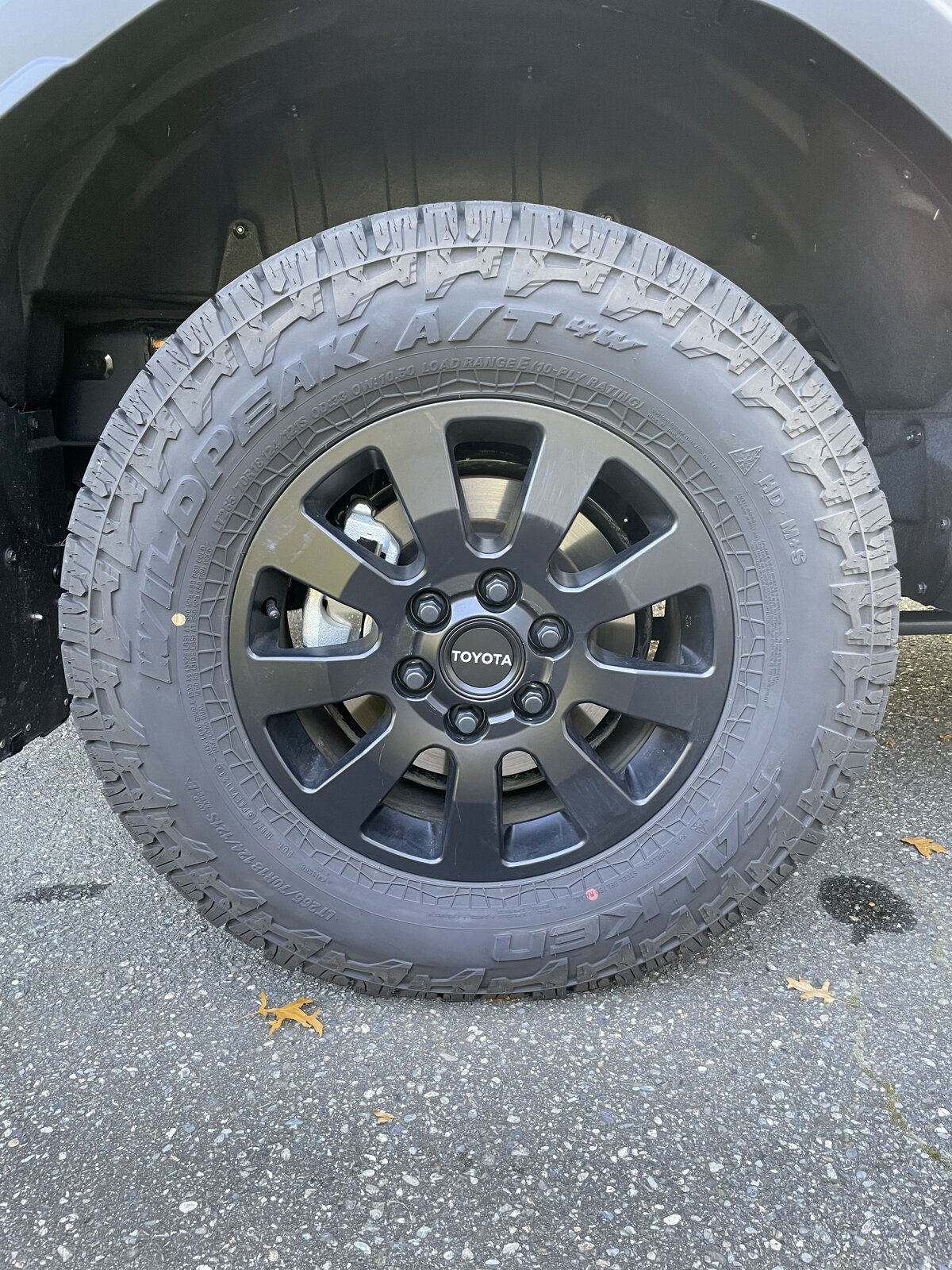 Flat Black Lug Nuts and Silver TOYOTA Logo Center Caps.jpg